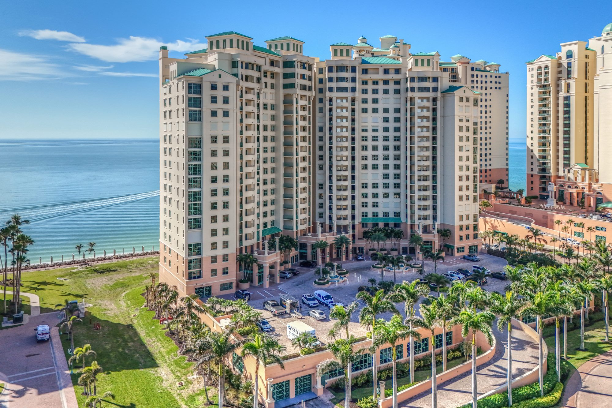 Aerial drone photo of property by NaplesArchMedia