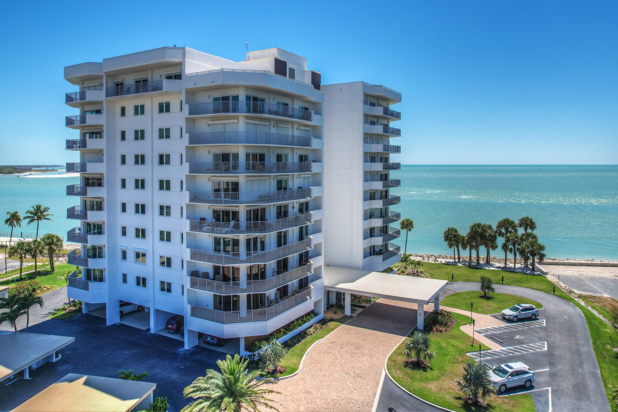 Aerial drone photo of property by NaplesArchMedia